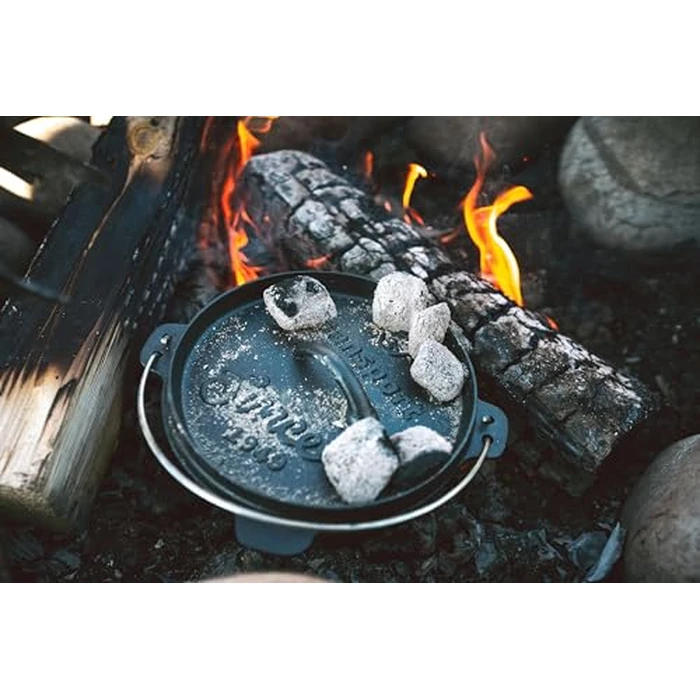 Stansport's Cast Iron Dutch Oven with Lid (16023) - Large 4 Quart Capacity, Durable Cast Iron Construction, Perfect for Outdoor Cooking, Home Kitchen and Camping Trips, Flat Bottom Design by StanSport - Image 4