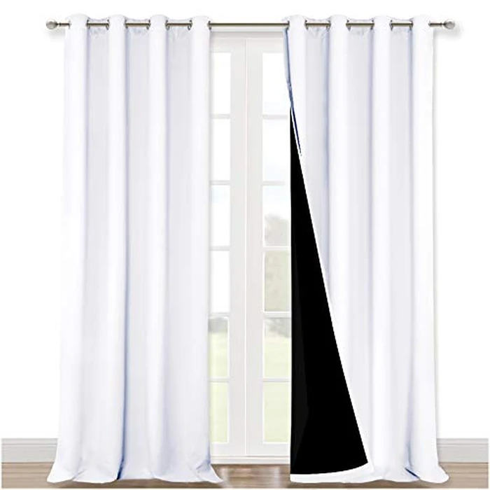 NICETOWN Room Warming Full Shading Curtains for Windows, Super Heavy-Duty Black Lined Blackout Curtains for Bedroom, Privacy Assured Window Treatment (White, Pack of 2, 52 inches W x 95 inches L) by NICETOWN - Image 1