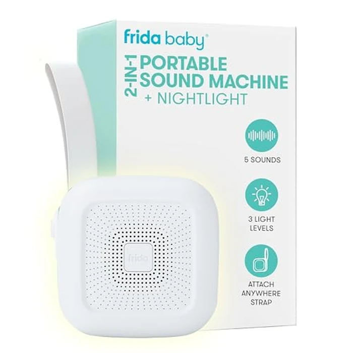 Frida Baby 2-in-1 Portable Sound Machine for Baby + Nightlight | White Noise Sound Machine for Baby with 5 Soothing Sounds & 3 Nightlight Modes | Travel Sound Machine Attaches to Strollers, Car Seats by Frida Baby - Image 1