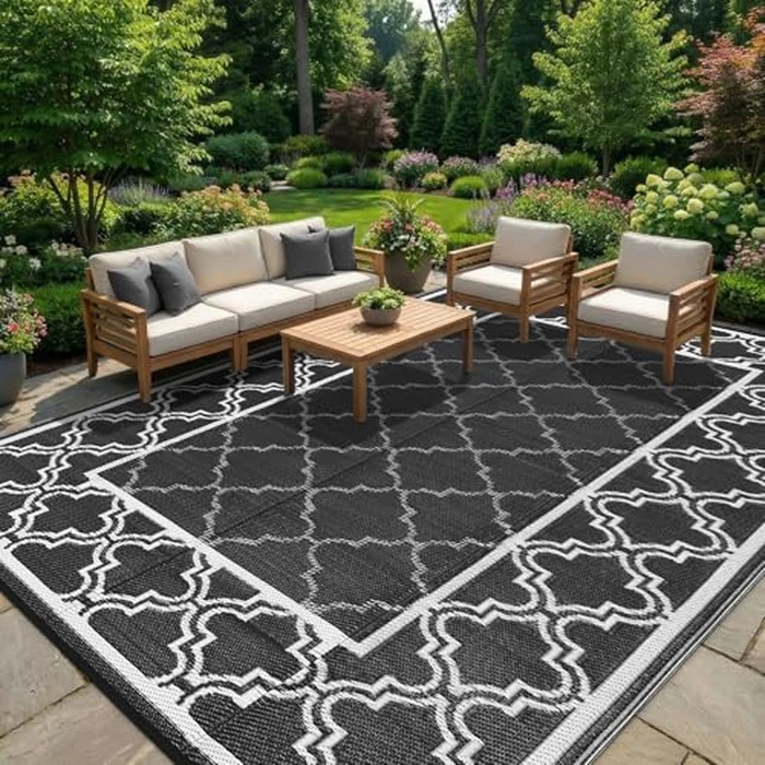 LUXLOOM Waterproof Plastic Straw Rug 9x12 Reversible Outdoor Rug, Weather Resistant Outside Carpet, Portable RV Camping Mat Modern Bordered Rugs for Patio Porch Garden Yard, Black and White by LUXLOOM - Image 1
