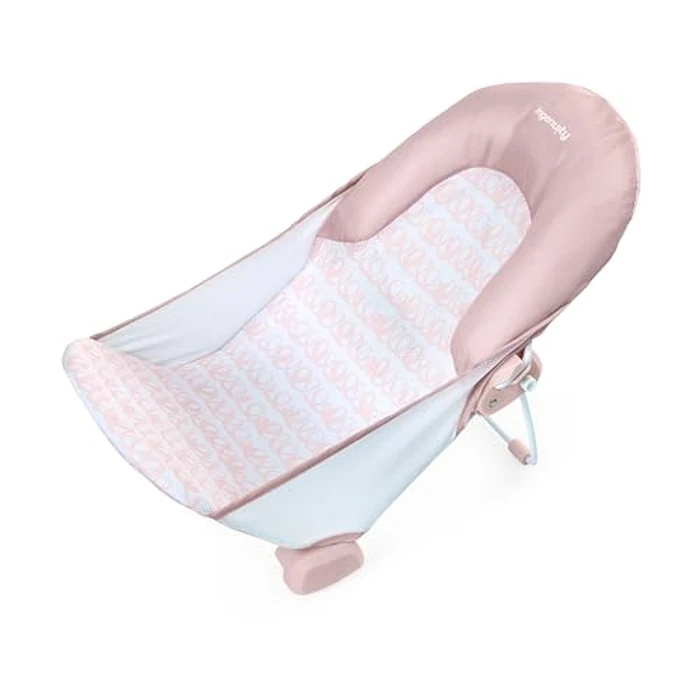 Ingenuity Foldaway 2-Position Bather, 2-Position Adjustable Support Baby Bath seat for Sink or Bathtub, Ages 0-6 Months, up to 20 pounds, Pink by Ingenuity - Used - Good condition - US$16.06