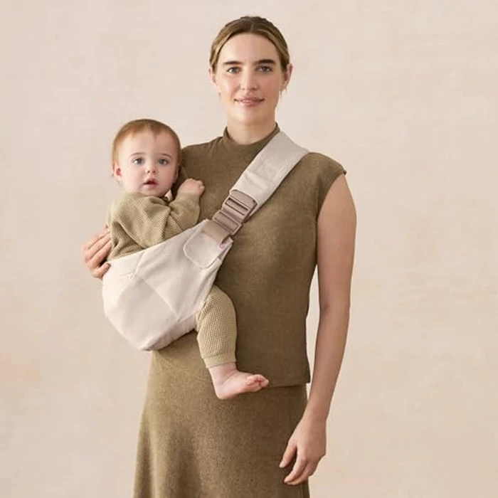 Ergobaby Upsie Sling Baby Carrier for Babies and Toddlers 6-48 Months (17-45 lbs) - 2-Position Ergonomic Baby Carrier with Front Storage Pocket, Hip-Healthy Positioning - Natural Beige by Ergobaby - Image 1