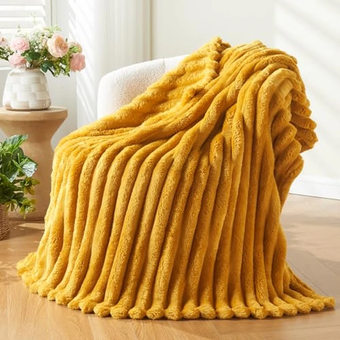 NEWCOSPLAY Super Soft Twin Blanket Mustard Yellow Premium Silky Flannel Fleece 3D Ribbed Jacquard Lightweight Bed Blanket All Season Use (Mustard Yellow Ribbed, Twin(60"x80")) by NEWCOSPLAY - Used - Very Good condition - CA$25.10