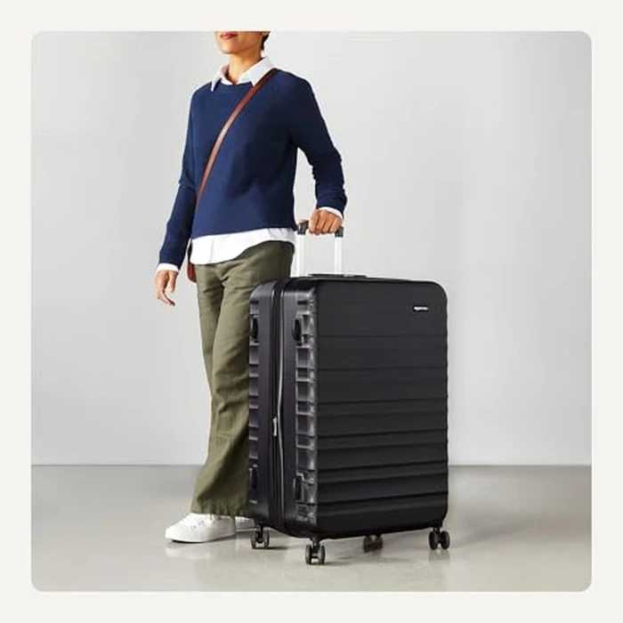 Amazon Basics 30-Inch Hardside Checked Luggage, Hardshell Suitcase With Wheels, Expandable For Up to 15% More Space, With Scratch-Resistant Surface, Four Multi-directional Wheels, Black by Amazon Basics - Image 3