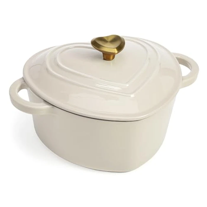 Paris Hilton Enameled Cast Iron Dutch Oven Heart-Shaped Pot with Lid, Dual Handles, Works on All Stovetops, Oven Safe to 500 degreesF, 4-Quart, Cream by Paris Hilton - Used - Very Good condition
