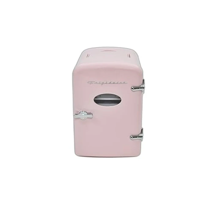 Frigidaire Pink Mini Personal Fridge Cooler, 1 Gal Capacity fits Six Cans, Includes Plugs for Home Outlet & DC Charger - 9.84" D x 7.09" W x 10.35" H by Frigidaire - Used - Like New condition - US$33.99