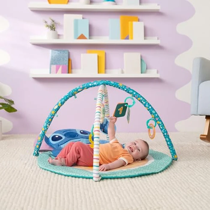 Disney Baby Stitch Party in Paradise Play Gym by Bright Starts- Play Mat with Tummy Time Pillow & 5 Take Along Toys, Ages 0M+ by Bright Starts - Image 2
