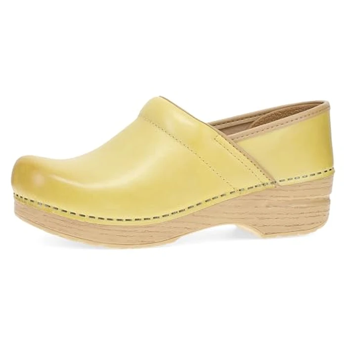 Dansko Professional Slip-On Clogs for Women - Rocker Sole and Arch Support for Comfort - Ideal for Long Standing Professionals - Healthcare Professionals Lemonade 6.5-7 M US by Dansko - Used - Like New condition