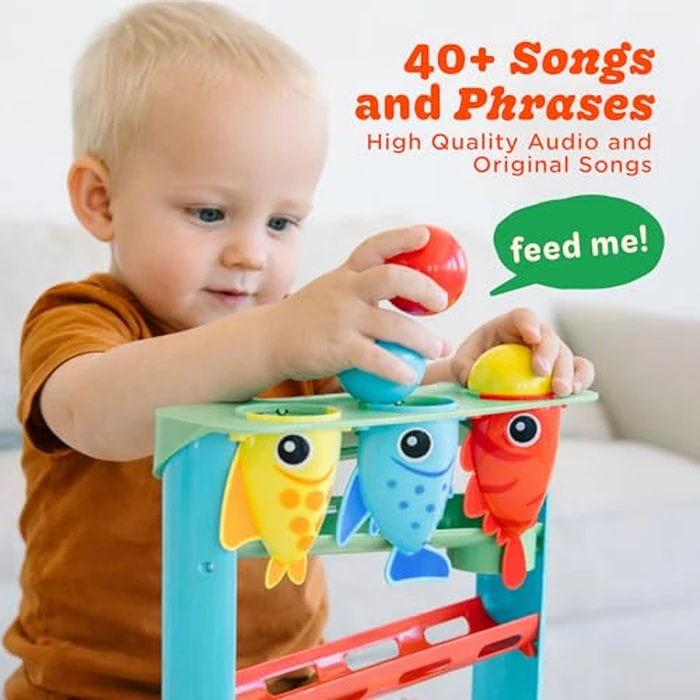 Move2Play, Feed The Fish | 30+ Fin-Tastic Songs & Phrases | Baby & Toddler Musical Toy | First Birthday Present for 1+ Year Old | Ages 6-24 Months | Boy & Girl Ball Drop Toy by Move2Play - Used - Like New condition - US$33.25