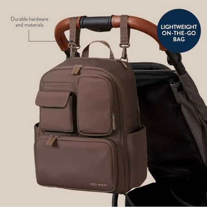 Itzy Ritzy Utility Diaper Bag Backpack - Features 17 Pockets (Including 2 Insulated Bottle Holders) & Trolley Sleeve and Includes Stroller Straps & Changing Pad - Part of the Belong Collection (Mocha) by Itzy Ritzy - Image 5