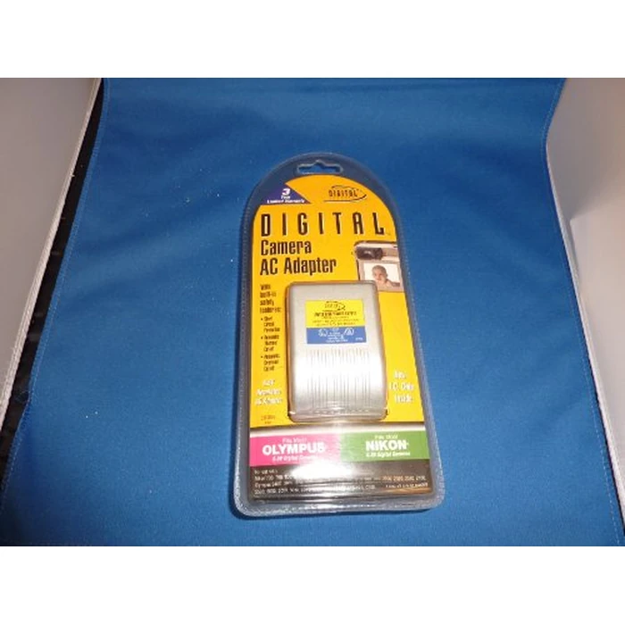 Digital Concepts CH900N AC Adapter for Olympus and Nikon 6-6.5V Digital Cameras by Digital Concepts - Used - Like New condition