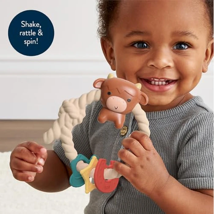 Itzy Ritzy Silicone Teether with Rattle; Rattle Teether Features Rattle Sound, Three Silicone Teething Rings and Raised Texture to Soothe Gums; Ages 3 Months and Up (Highland Cow) by Itzy Ritzy - Image 2
