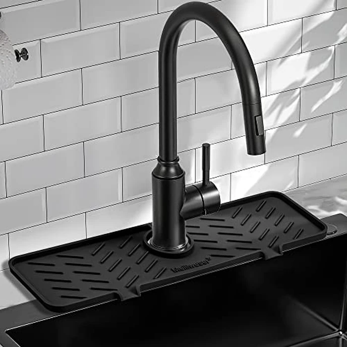 Meiliweser Silicone Faucet Mat for Kitchen Sink - Gen 2 Splash Guard with Upgraded Outlet & Slope - 18” x 5.1” Water Catcher & Sink Sponge Holder for Kitchen and Bathroom (Black) by Meiliweser - Used - Very Good condition