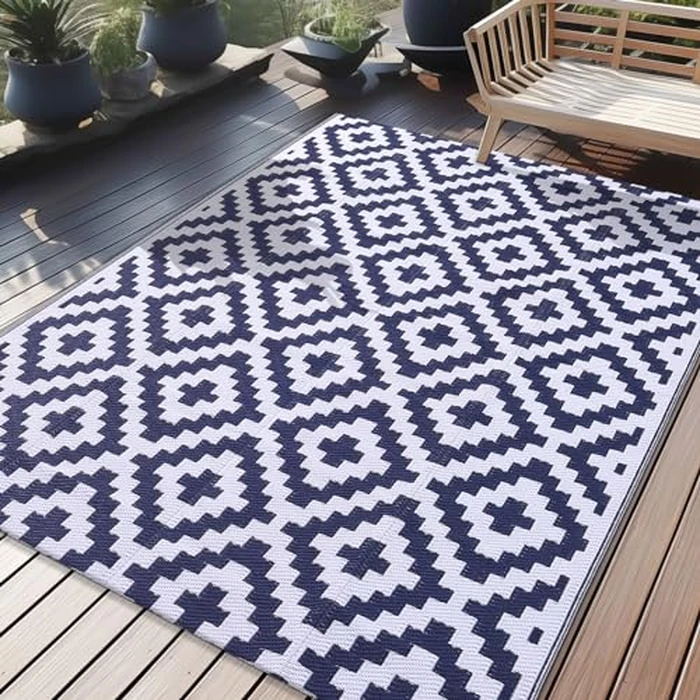 OLANLY Outdoor Rug Waterproof Reversible 4x6 ft, Durable Plastic Straw Patio Camping Carpet, Large Foldable RV Mat for Backyard, Deck, Picnic, Camper, Bench, All-Weather, Lightweight, Navy & White by OLANLY - Used - Like New condition