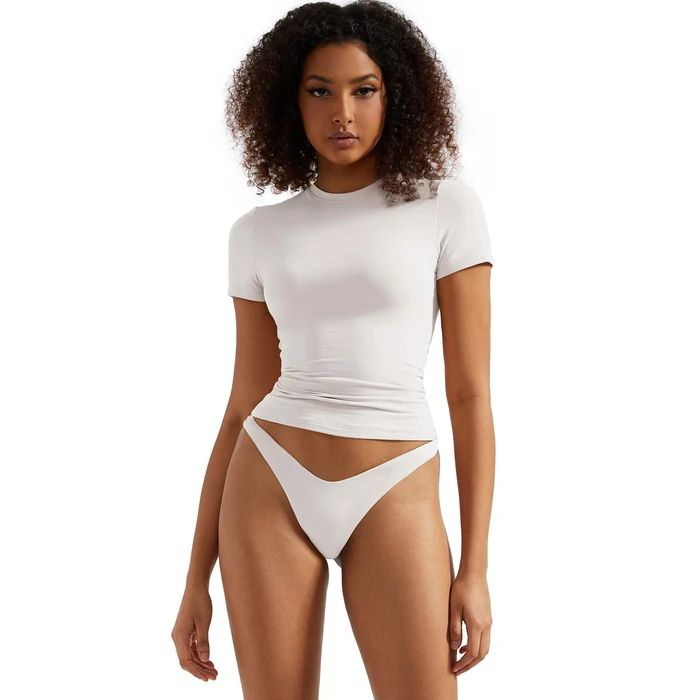 SUUKSESS Women Double Lined Fitted Basic Tee Shirts Crew Neck Short Sleeve Y2K Going Out Crop Tops (Snow White, S) by SUUKSESS - Used - Like New condition - US$22.00