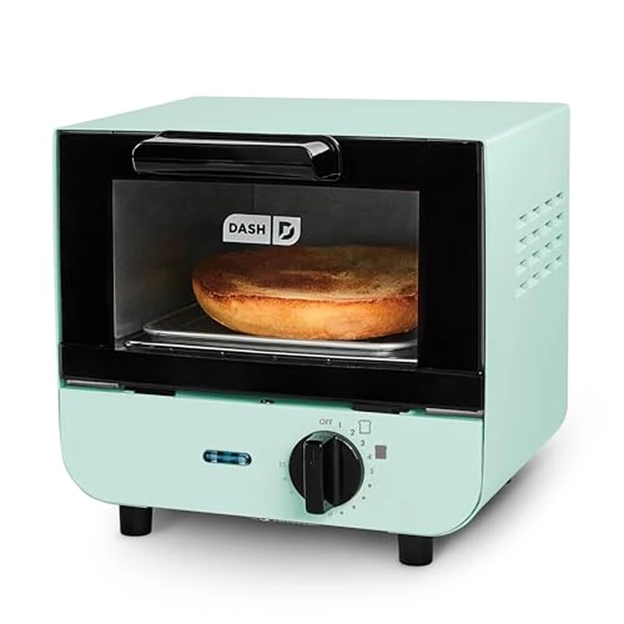 Dash Mini Toaster Oven - Sleek & Stylish - For Creative Homemade Treats - Compact, Space-Saving Design - adjustable temperature dial - Removable Baking Tray - Aqua by DASH - Used - Like New condition