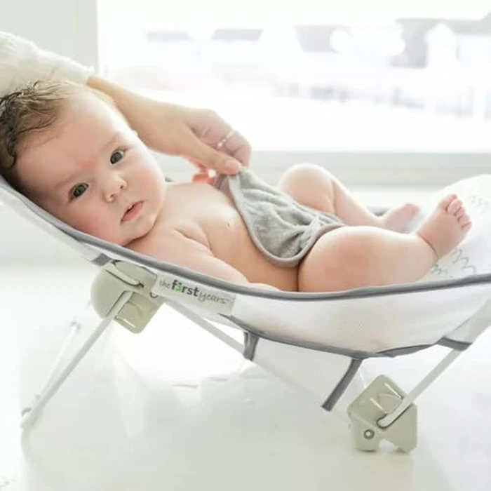 The First Years Sure Comfort Folding Baby Bather - Foldable Baby Bath Seat and Lounger for Home or On the Go - for Sink or Tub Use - Non-Slip Seat - For Up to 15 Lbs by The First Years - Image 2