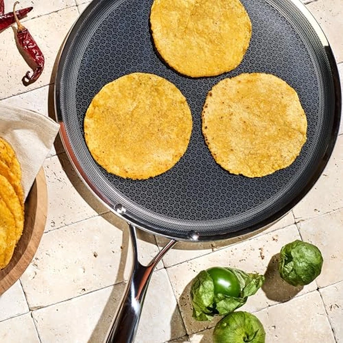HexClad Hybrid Nonstick 12-Inch Griddle Pan, Stay-Cool Handle, Dishwasher-Friendly, Oven-Safe Up to 900 degreesF, Induction Ready, Compatible with All Cooktops by HexClad - Image 2