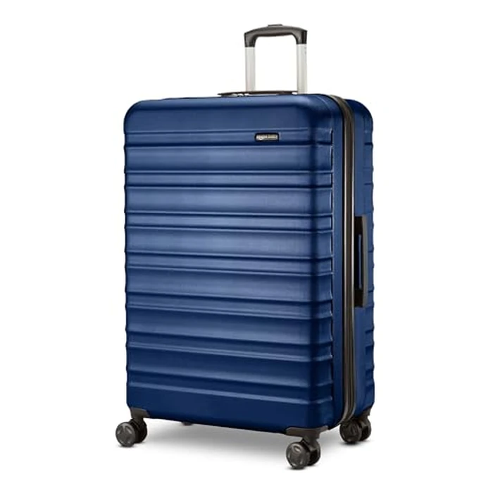 Amazon Basics 26-Inch Hardside Checked Luggage, Hardshell Suitcase With Wheels, Expandable For Up to 15% More Space, With Scratch-Resistant Surface, Four Multi-directional Wheels, Navy Blue by Amazon Basics - Image 1