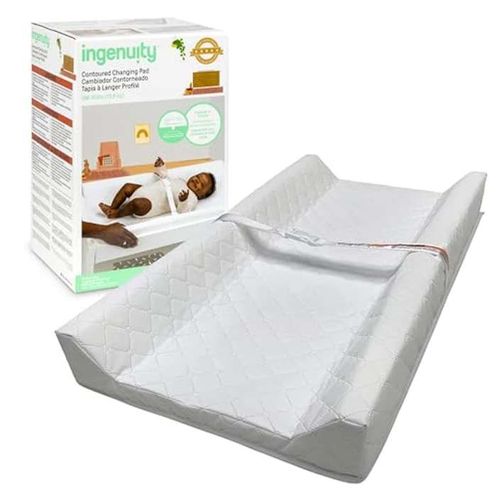 Ingenuity Contoured Changing Pad - Includes Waterproof Changing Liner and Safety Fastening Strap with Quick-Release Buckle by Ingenuity - Used - Like New condition - US$17.01