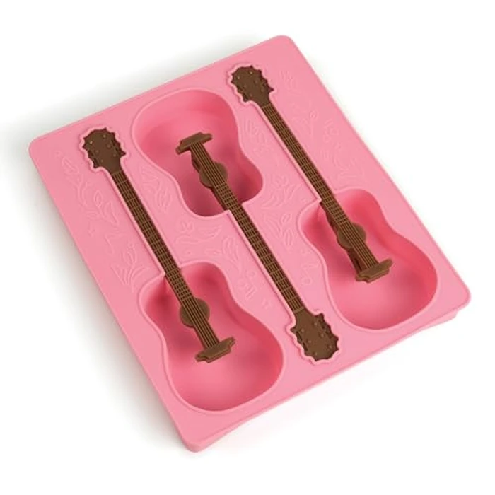 Dolly Parton Guitar Ice Mold Tray, Pink, Creates Three Guitar Frozen Drink Stirrers, Great for Music Lovers by Dolly Parton - Used - Like New condition - US$20.93