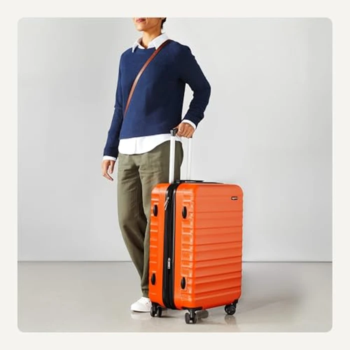 Amazon Basics 26-Inch Hardside Checked Luggage, Hardshell Suitcase With Wheels, Expandable For Up to 15% More Space, With Scratch-Resistant Surface, Four Multi-directional Wheels, Orange by Amazon Basics - Image 3