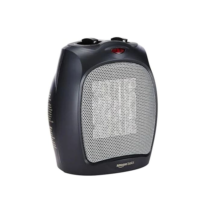Amazon Basics Ceramic Space Heater, Portable Indoor Heating Solution, With Overheat and Tip-Over Protection, Thermostat, Non-Oscillating, 1500W, 7.52"D x 6.34"W x 9.45"H, Black by Amazon Basics - Used - Acceptable condition - US$14.25